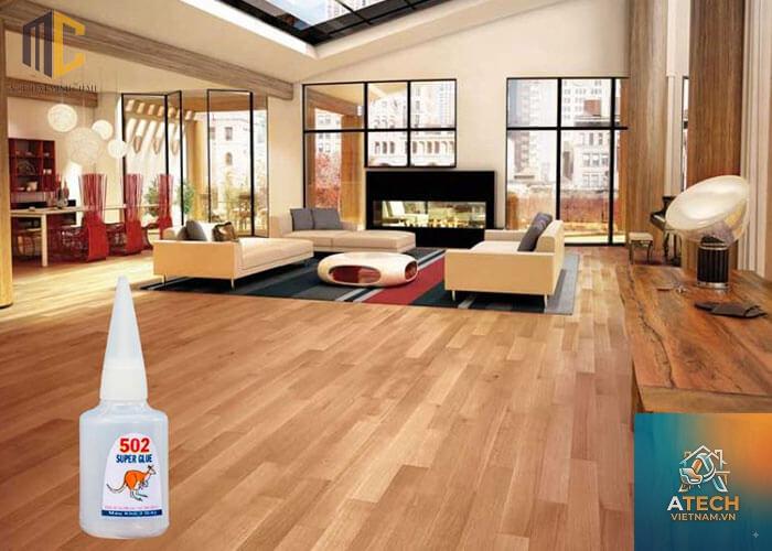 cách tẩy keo 502 trên sàn gỗ